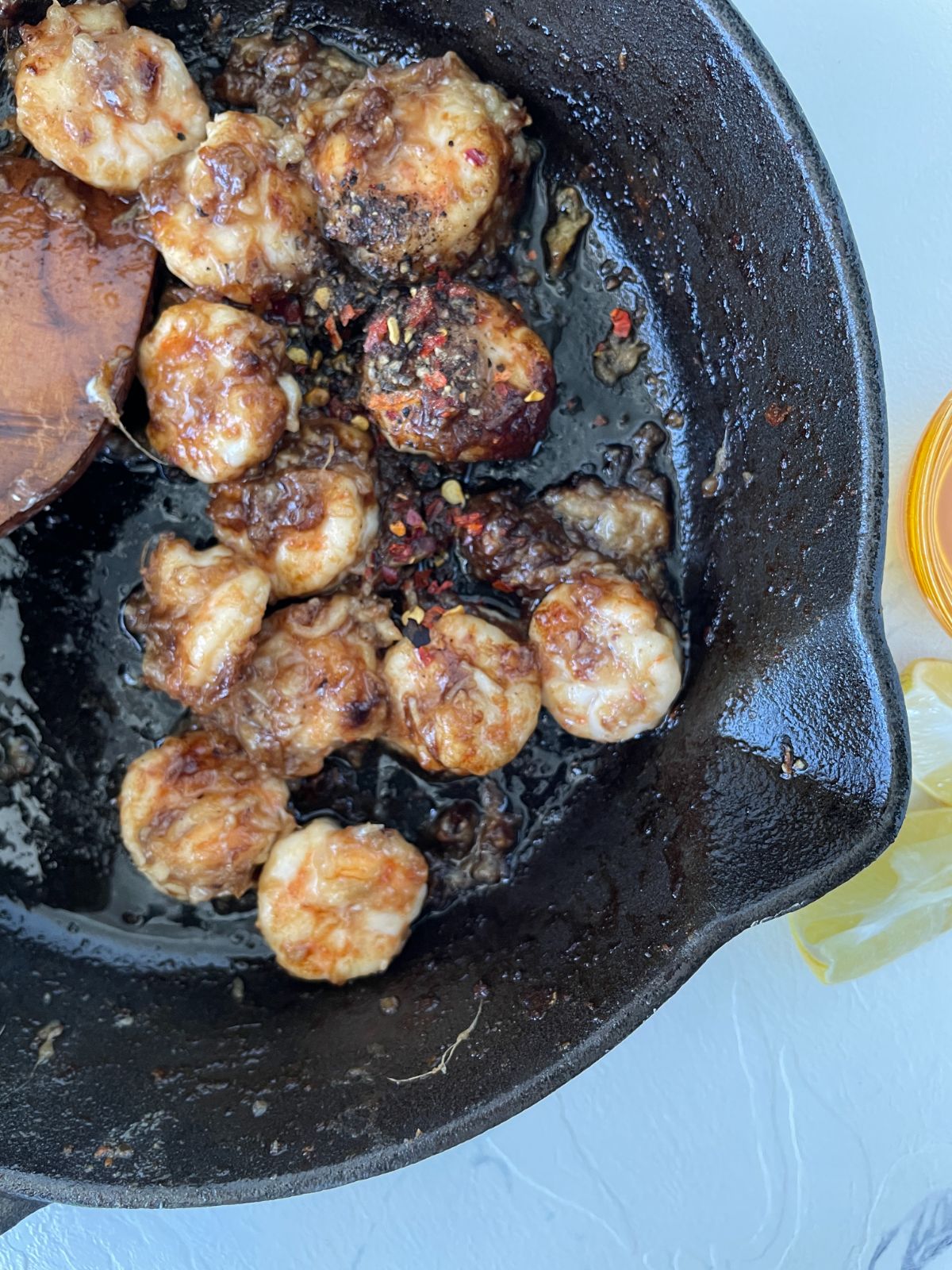 add honey, corn flour and little sriracha with shrimp mixture in a pan 