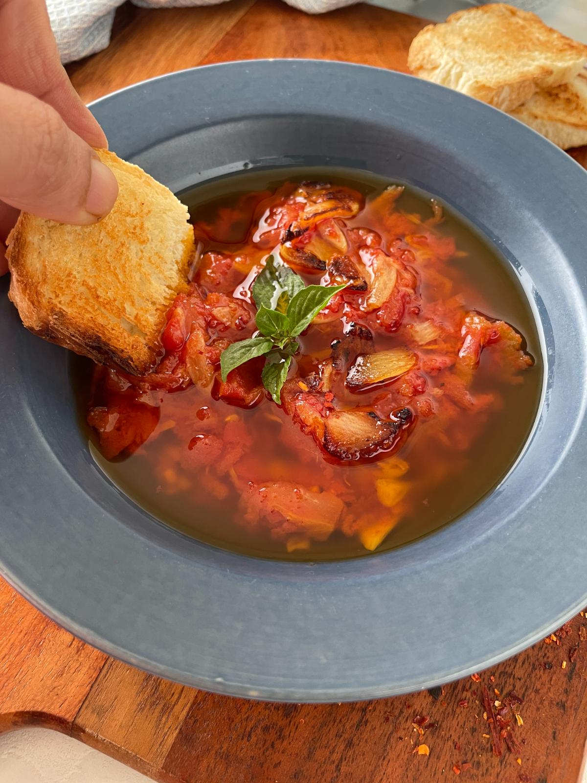 hot tomato oil with toasted bread