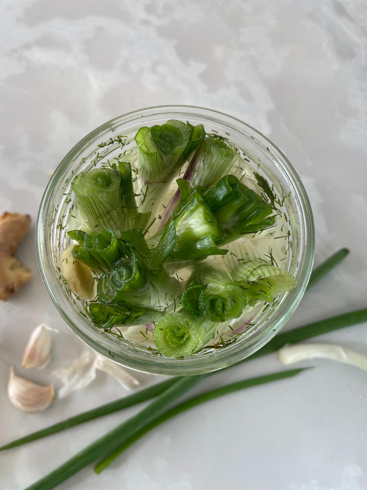 pickled scallions in a jar