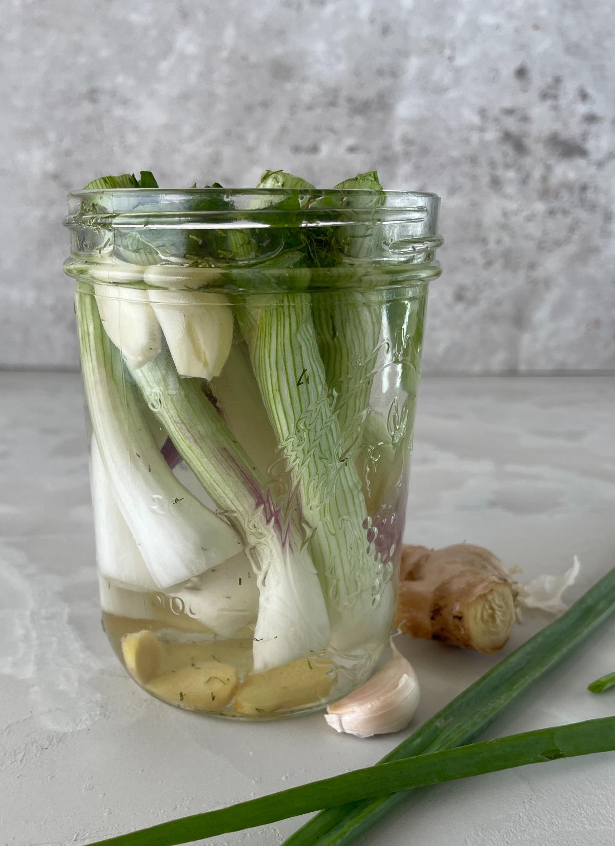 pickled green onions in a jar
