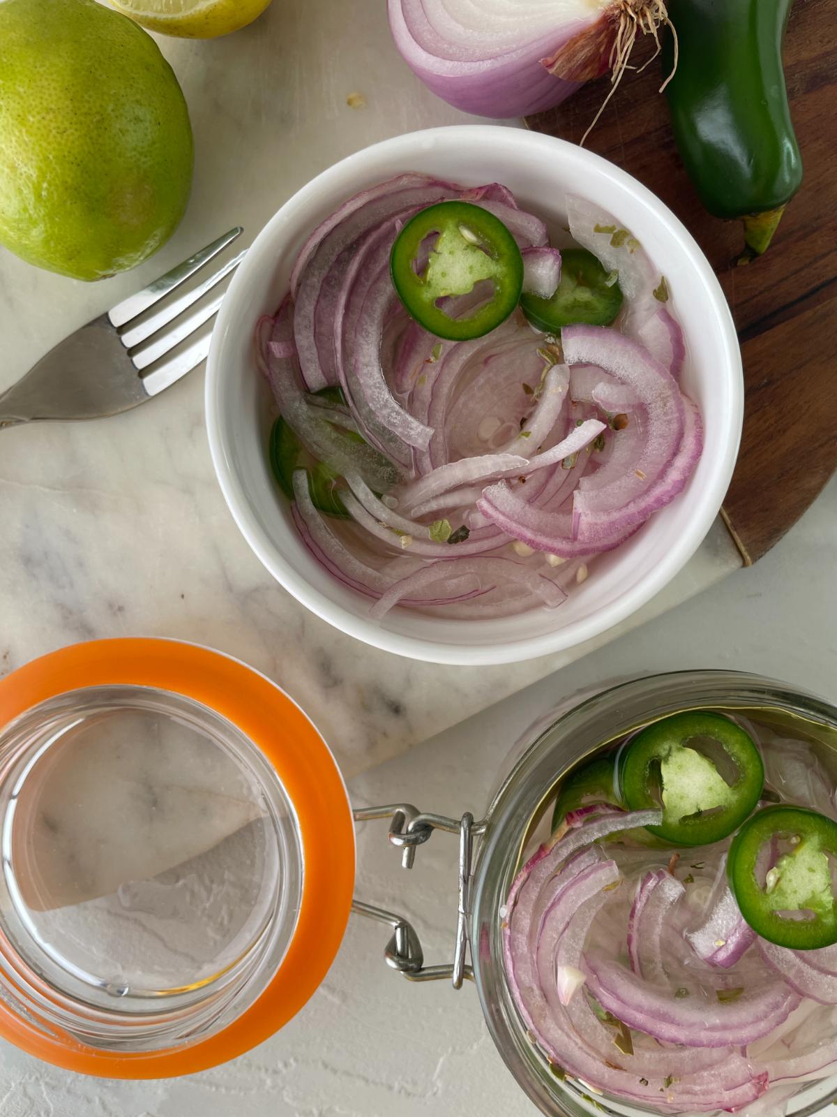 lime pickled onions in a small bowl