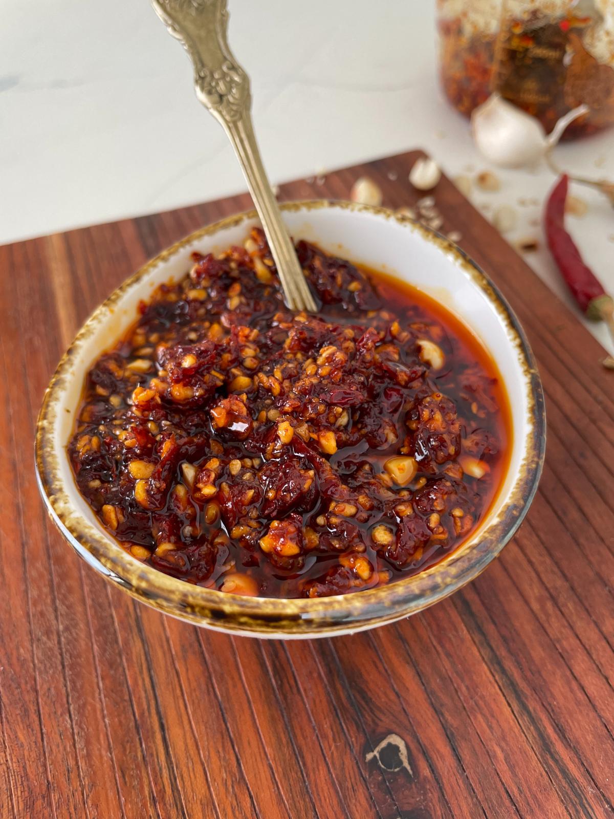 chunky Mexican chili oil served in a small bowl