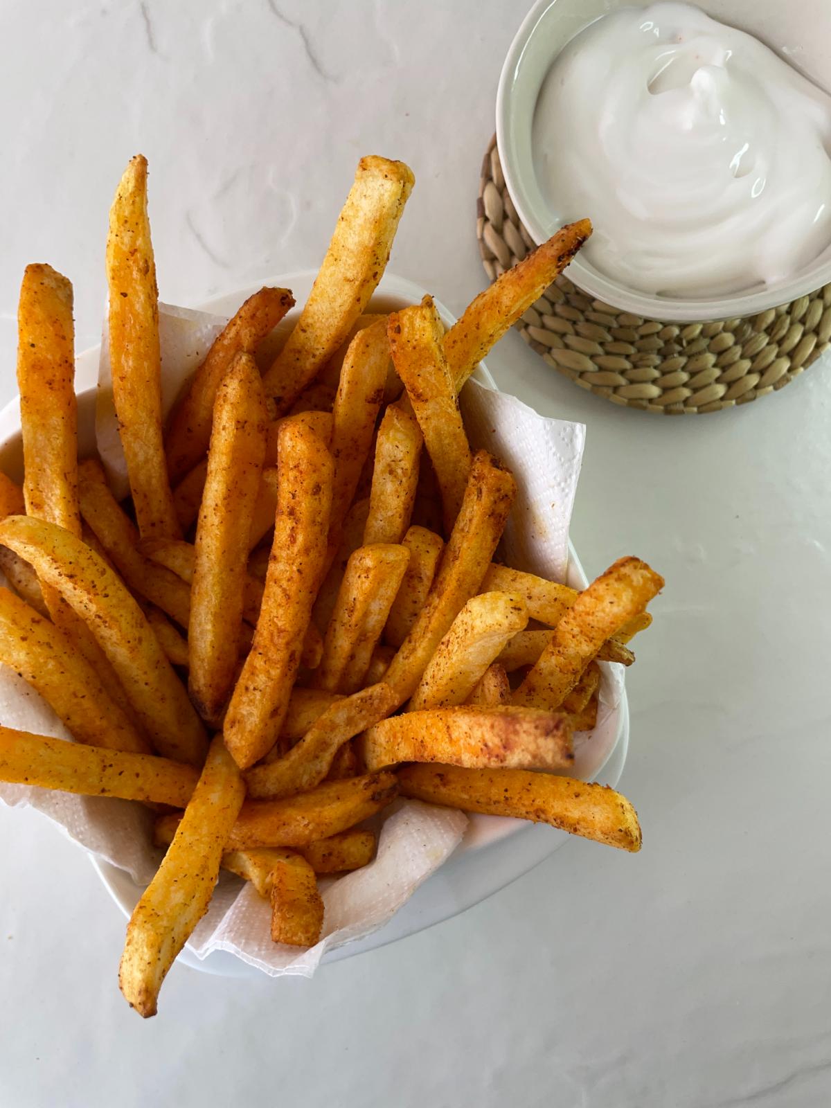 crispy curry fries served with a dip