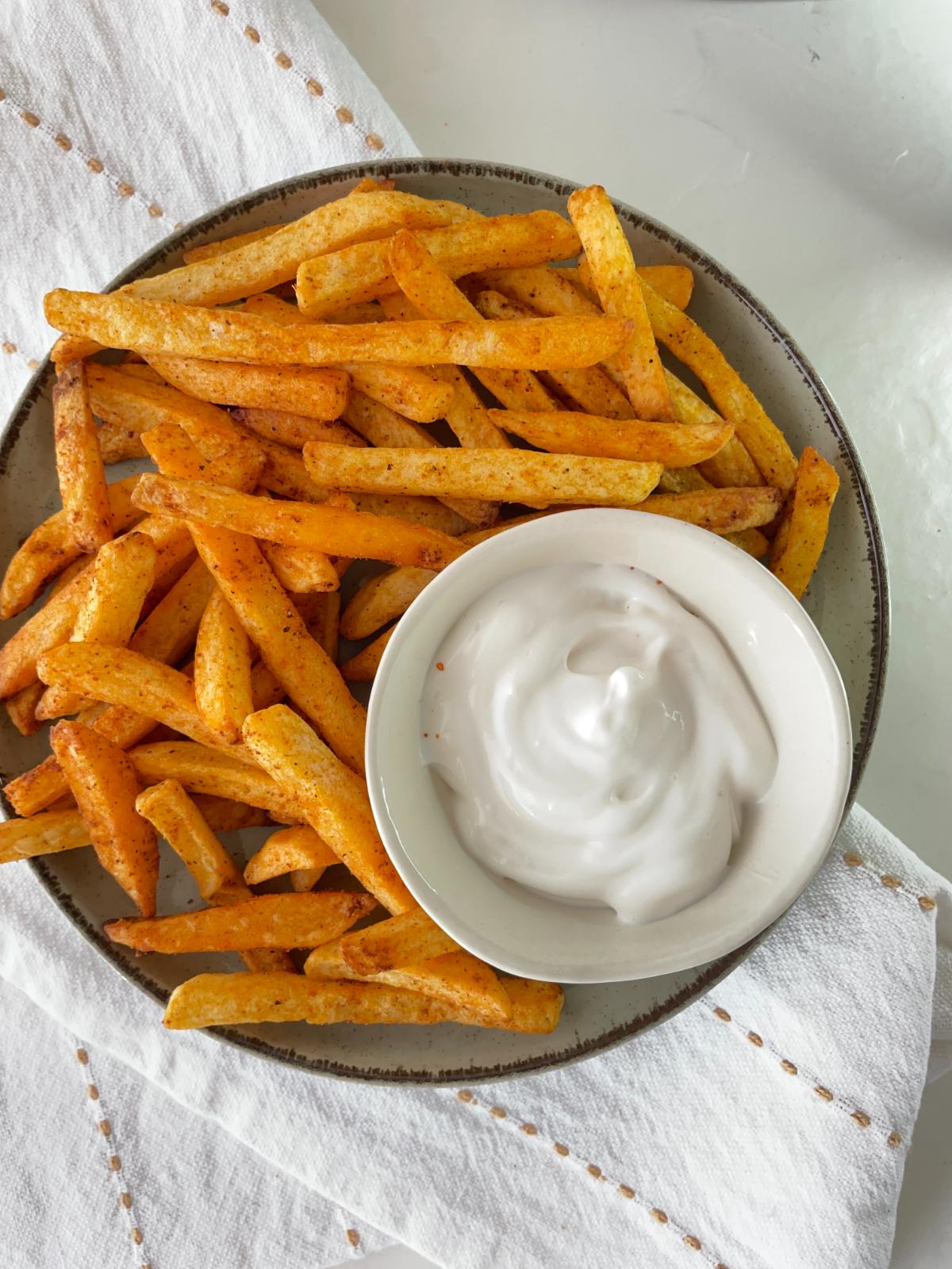 crunchy Air Fryer curry fries served with a creamy dip