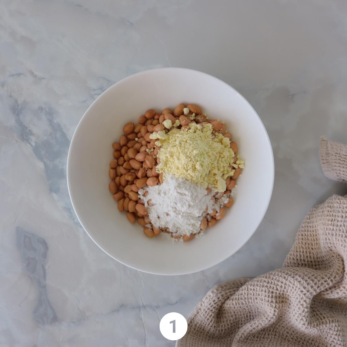 take peanuts and add all the ingredients in a bowl
