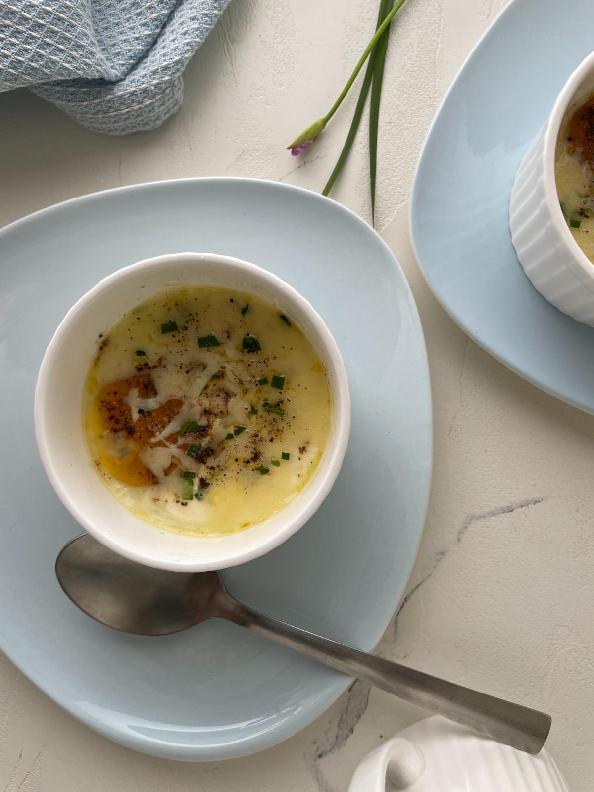 French baked eggs served in individual ramekins