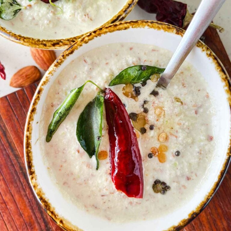 creamy almond chutney topped with tempering in a bowl