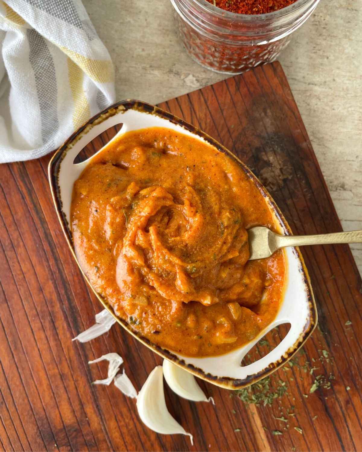 creamy and buttery cajun butter served in a bowl