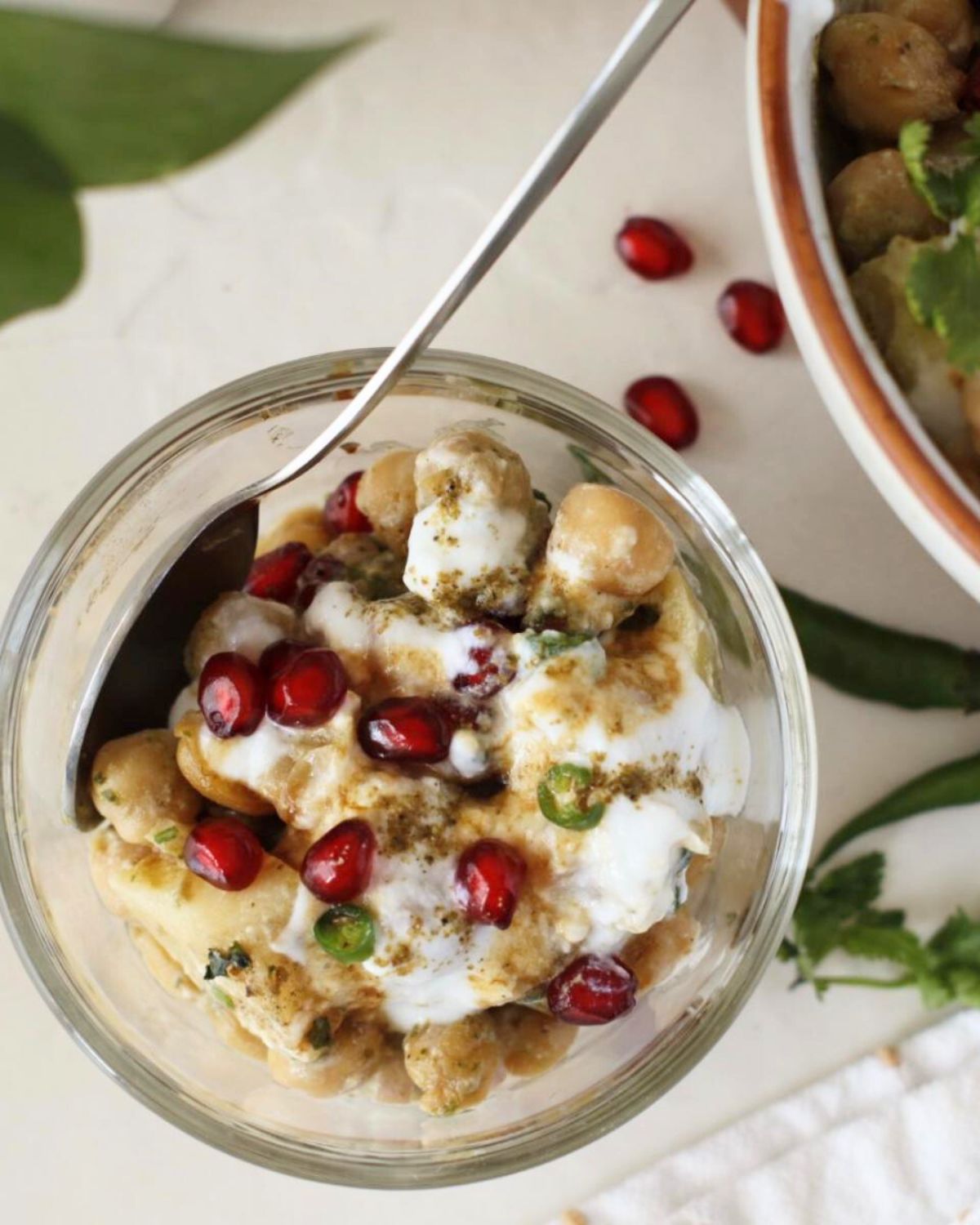 Dahi Chana Chaat in a bowl with spoon