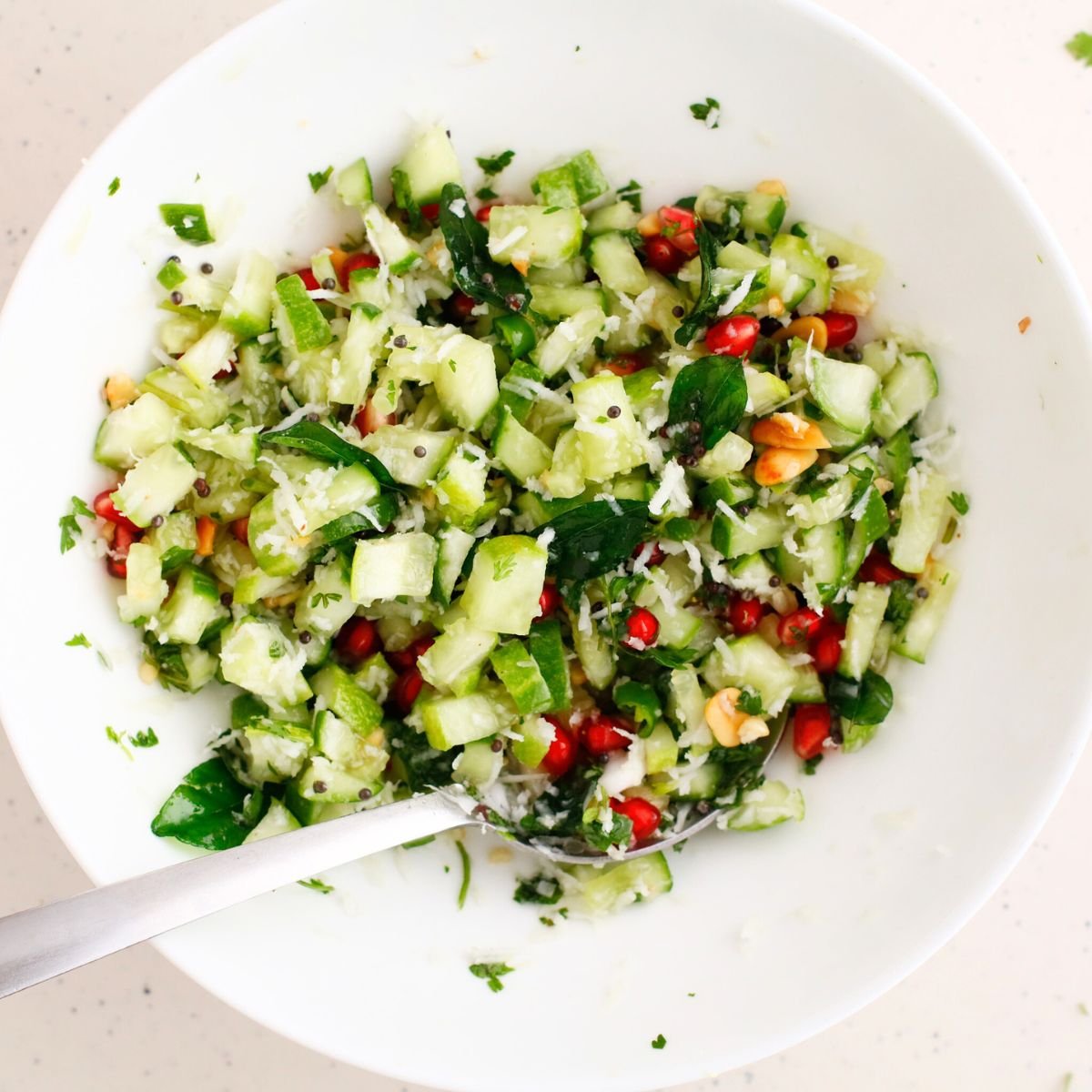 Chopped green chilies, sugar and lime juice are added in the bowl. Toss well to combine