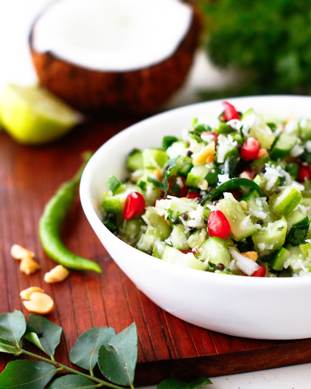 side view image of Kakdi Chi Koshimbir (Cucumber Salad) in a bowl