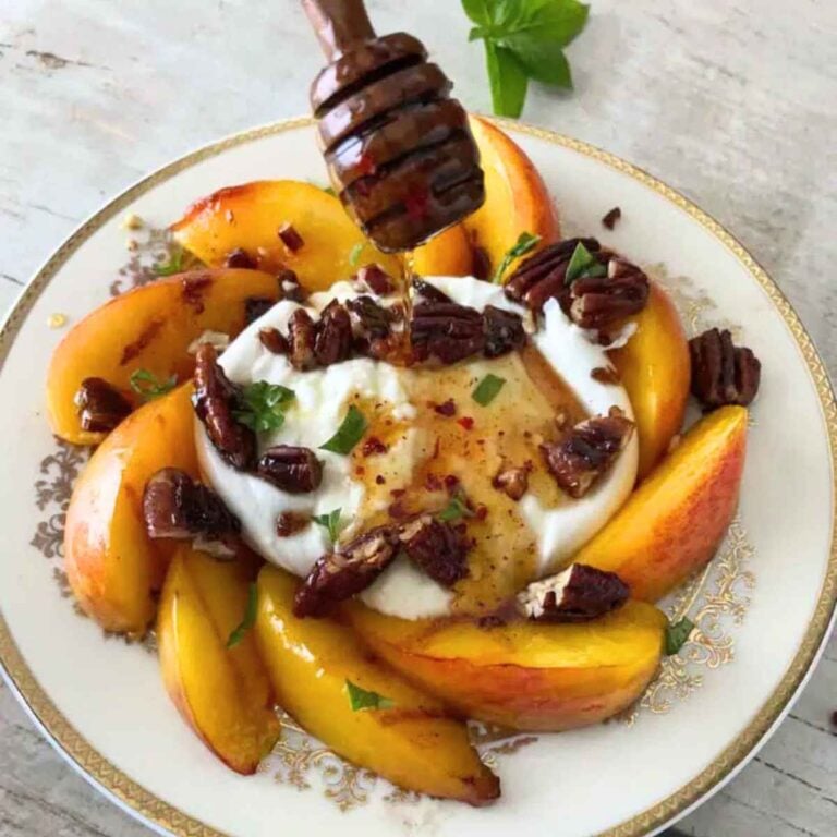 peach and burrata salad drizzled with hot honey
