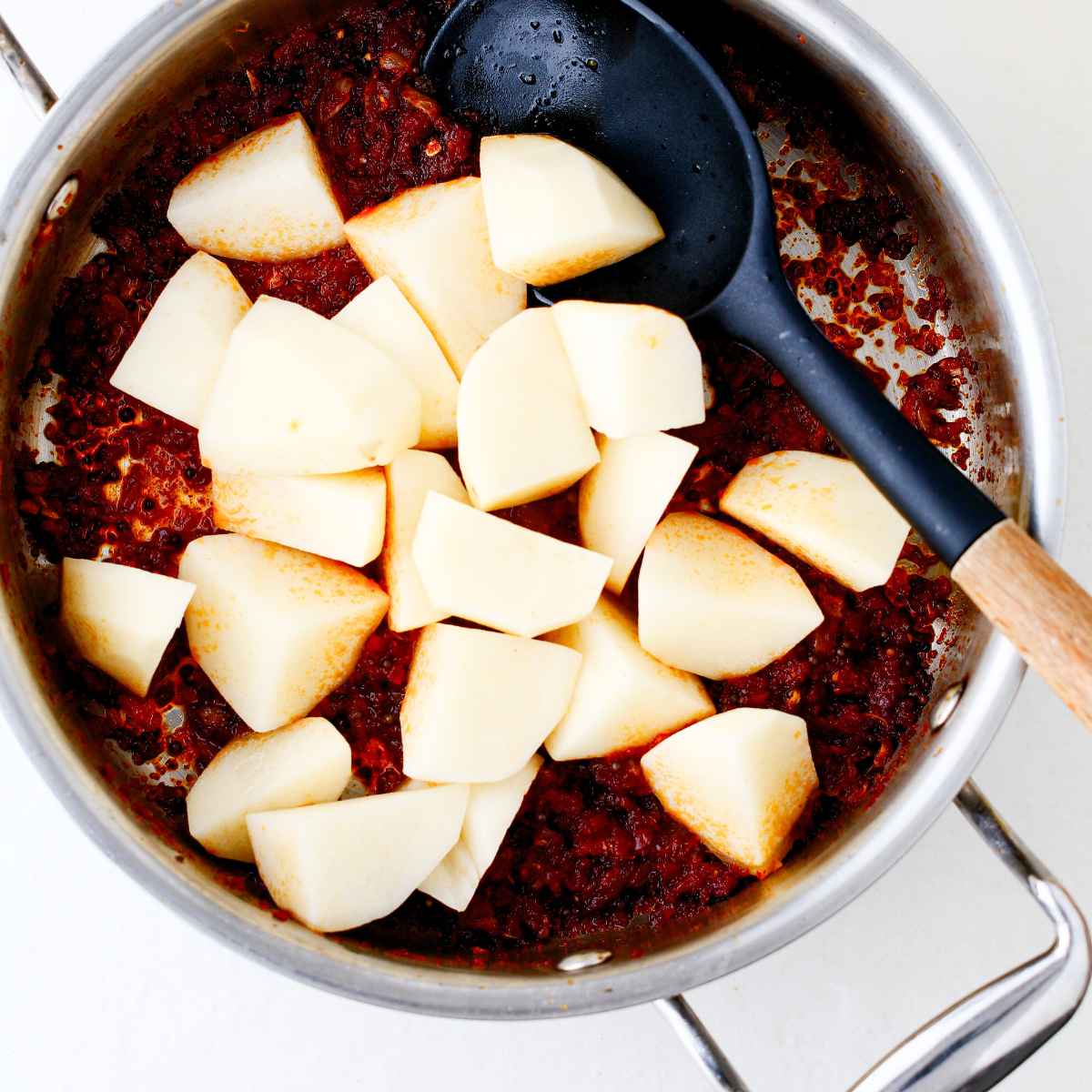 Add diced potatoes to the pan
