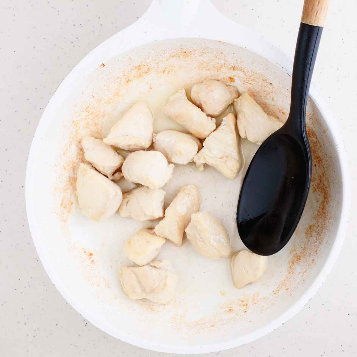 Saute the chicken pieces in a pan