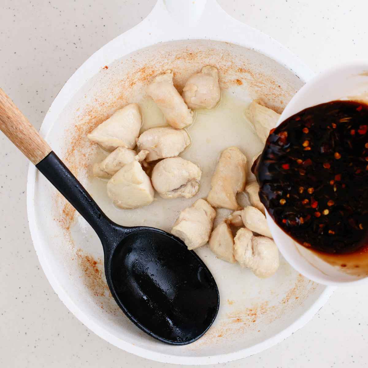 Add sauce mixture over the the chicken in the pan