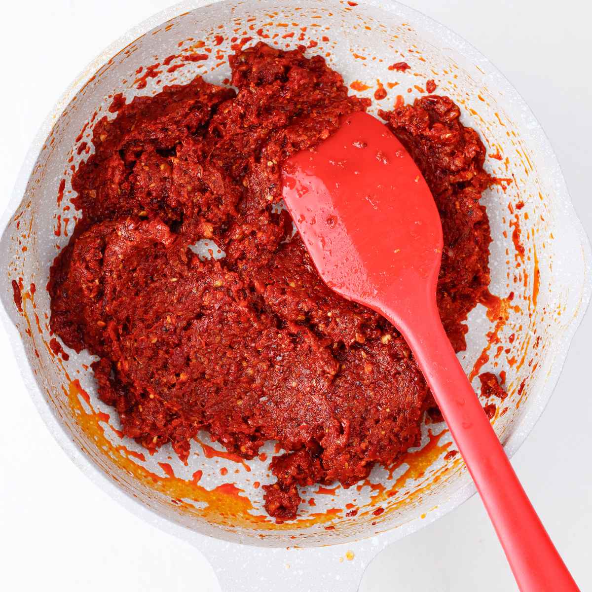 Transfer the paste into the pan and cook for sometime...