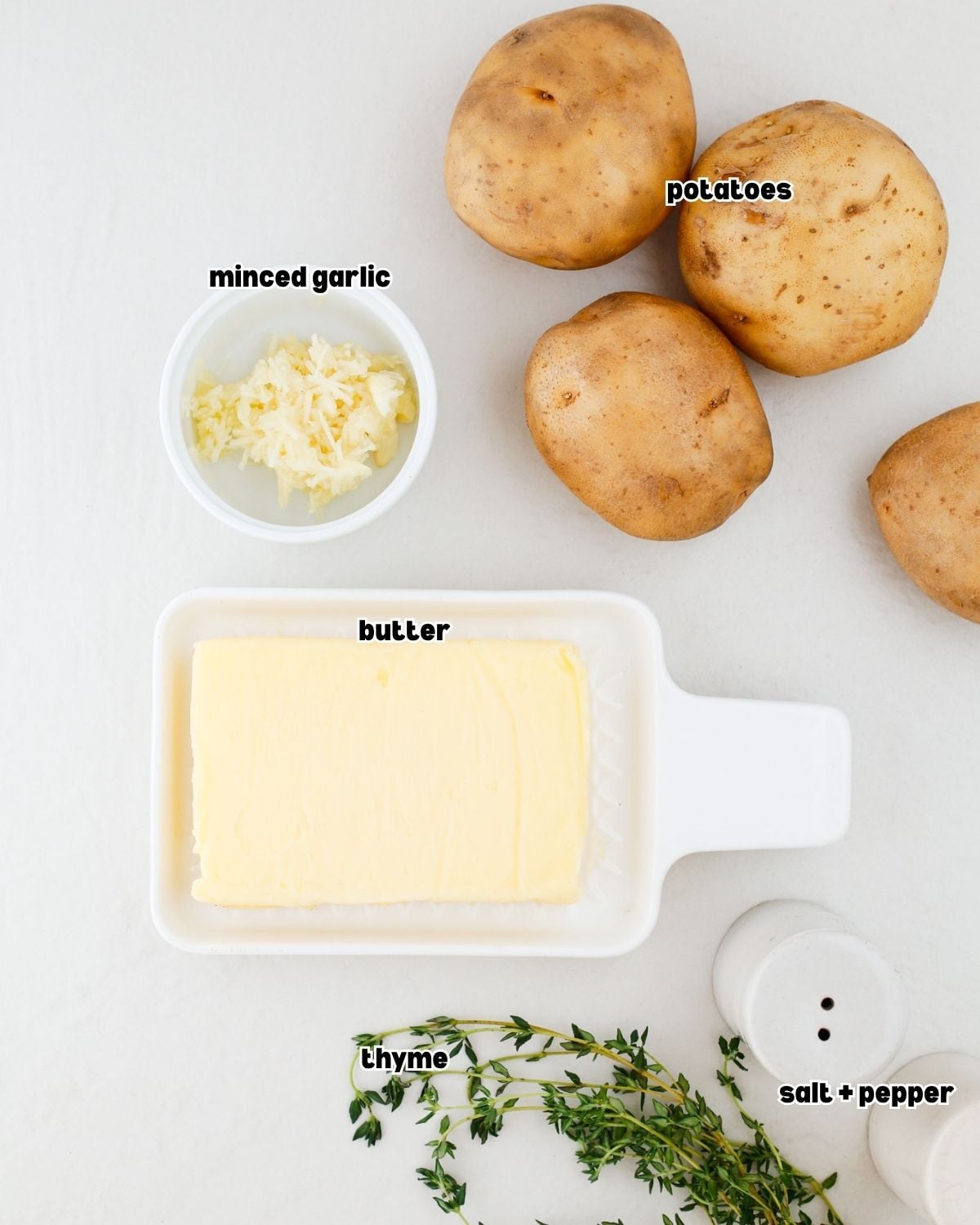 Potatoes, butter, garlic and seasonings for Anna potatoes